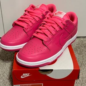Women’s Nike Dunk Low “Hot Pink” in monochromatic pink appearance.